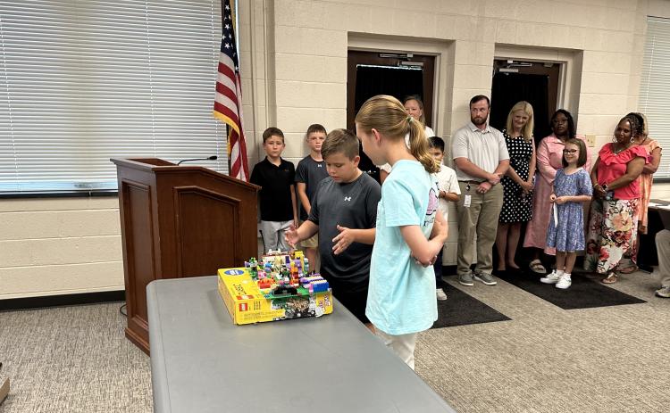 Students participating in the summer SAIL learning academy demonstrate what they learned over the summer. Pictured from left to right: Lincoln Seawright, 5th grader at North Hart Elementary and Millie Colson, 5th grader at South Hart Elementary.