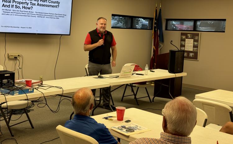 Real estate broker Jim Martell talked to the property owners association regarding property tax appeals during its meeting Aug. 19.