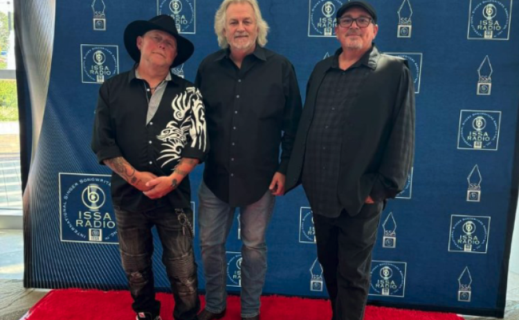 Steve Coughlin and his band Probable Cause received four nominations from the International Singer Songwriters Association last month. Pictured above (from left to right): Mickey Davenport, Steve Coughlin, and Scott Callaway.