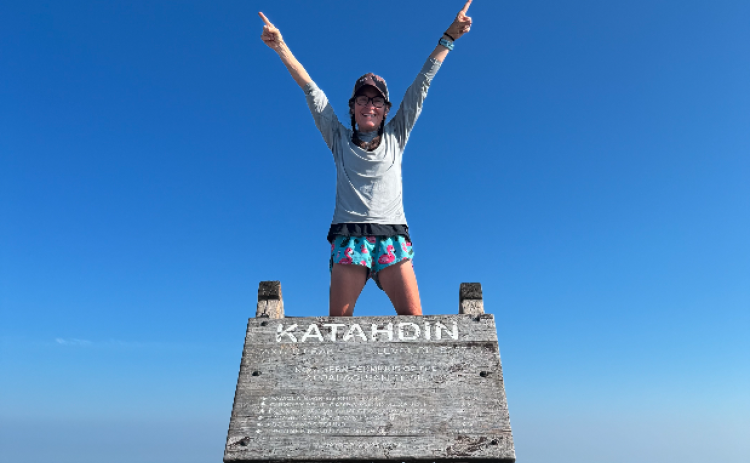 Hartwell native Julie George seen above at the northern terminus of the  Appalachian Trail. George completed her hike in 161 days.
