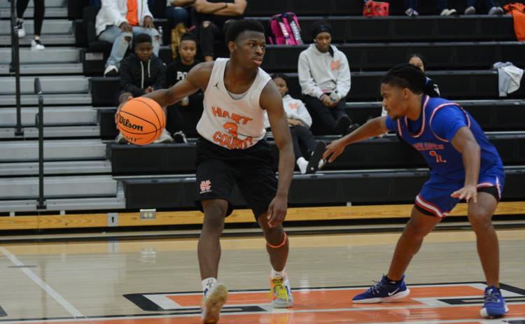 Senior guard Andrew Maxwell drops 20 points in 60-49 win over Oglethorpe County in a scrimmage game.