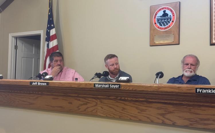 From left to right: Commissioners Joey Dorsey, Jeff Brown and Marshall Sayer listen to citizens regarding recreation department fees.