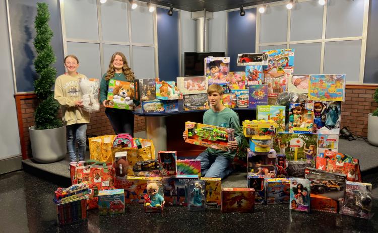 Pictured above (from left to right): Angel Tree ambassadors Nakalegh Cromer, Claire Hoy, and Tyler Bowers.