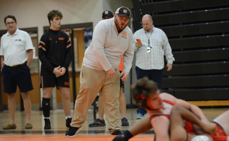 Mat Dogs head coach Sam Simpson coaching during a match back on Nov. 20.