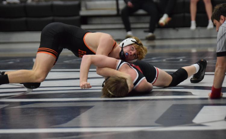 Senior wrestler Harrison Krause looks to pin his opponent and wins his match against Stephens County at the Area Duals. Photo by Shane Scoggins/Franklin County Citizen Leader.