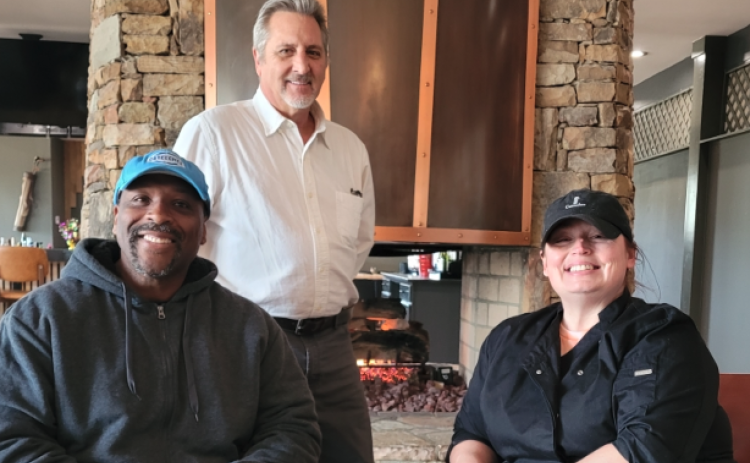 (Front row, L-R) Tony Thorton, chef lead/assistant manager, and Tamra Woody, chef, along with (back row) Ivan Von Neibart, executive chef/restaurant manager, are working to restore Cateechee Golf Club and Waterfall Grille back to its original glory after being Cateechee Ranch and Whispering Irons. Photo submitted by Tony Thornton.