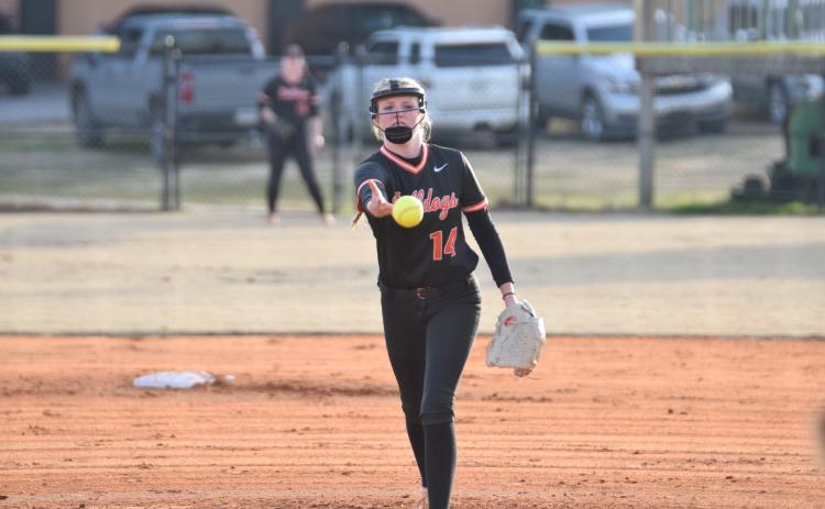 Junior Emma Mitchell delivers the pitch in the 2-0 loss to Franklin County on Feb. 18. Photo by Shane Scoggins/Franklin County Citizen Leader