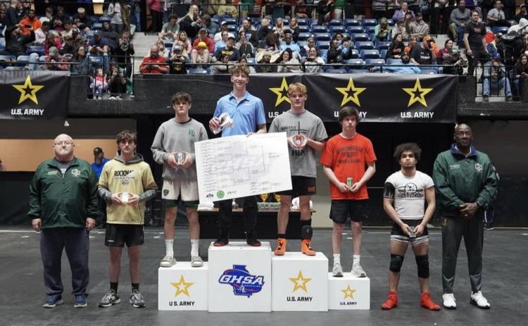 Senior Harrison Krause (fourth from the left) finishes as a state runner up at the state traditional meet in Macon on Feb. 13-14.