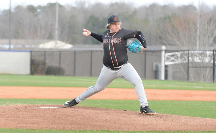 Sophomore pitcher Landry Carter winds up to pitch as he pitched two innings allowed one earned run and punched out four batters in the 6-5 win over Jefferson.