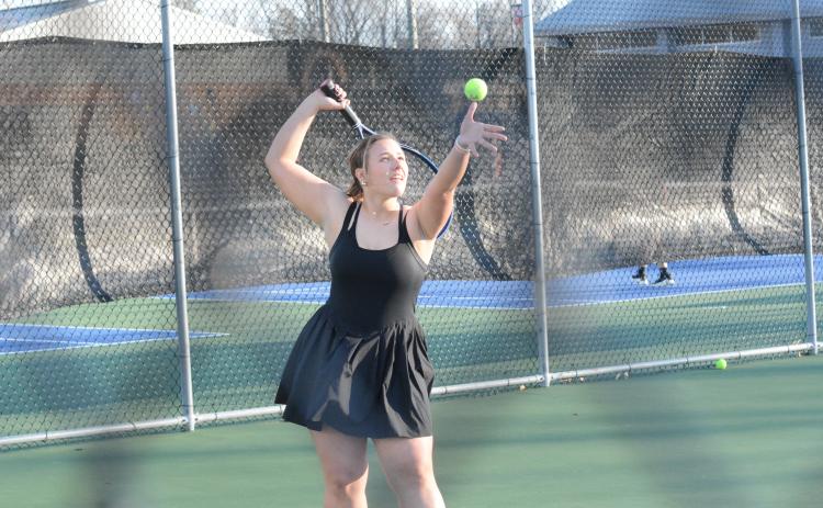 Adah Grace Johnson prepares to serve in the 5-0 loss to Stephens County on Feb. 27.
