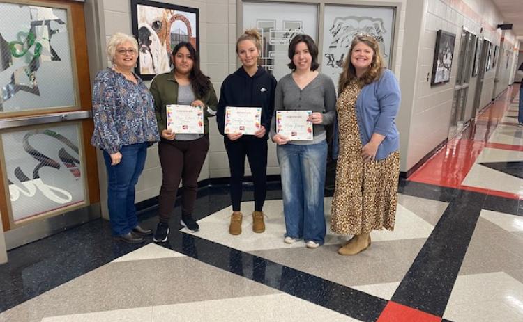 Hart County Farm Bureau art contest winners pictured with HCFB Women’s Committee Chair Stephanie Guzman and HCFB’s Tina Simmons include (clockwise, L-R) Guzman, Academic Christian Collective’s (ACC) Lila Layton and Simmons; Simmons, Hart County High School’s Maggie Rodrigues-Morales, Brooklyn Vassar, Maggie Noriega and Guzman; Guzman, ACC’s Layla Throckmorton and Simmons; and Guzman, ACC’s Titus McCall and Simmons. (Photo submitted by Tina Simmons)