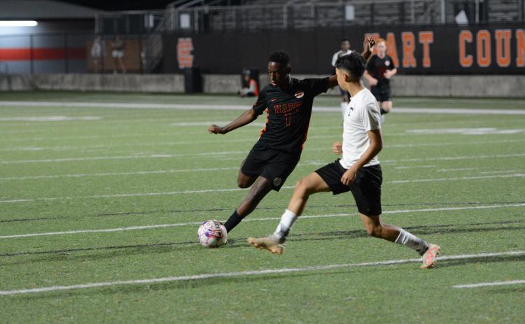 Cayson Craft finishes with two assists and a goal in the 8-0 win over the Bulldogs of Thomson on April 18. (Photo/Benjamin London)