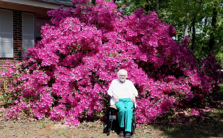 Sylvene Fleming (above and below), who turned 99 on Tuesday, sits in front of a huge azalea bush on the side of her home off of Old Highway 29 on Thursday, April 10. She planted the flowers a few years after moving there in 1956. (Photo/Rose Scoggins)