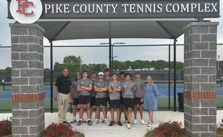 Pictured is the Hart County High School boys tennis team as they celebrate after their 3-0 win over No. 9 seed Pike County and advance to the Sweet Sixteen. (Photo submitted by Hart County High School)
