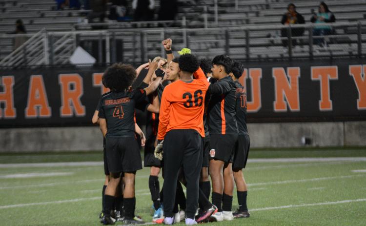 The Hart County boys soccer team breaks down the team huddle from a game earlier in the season. (Photo/Benjamin London)