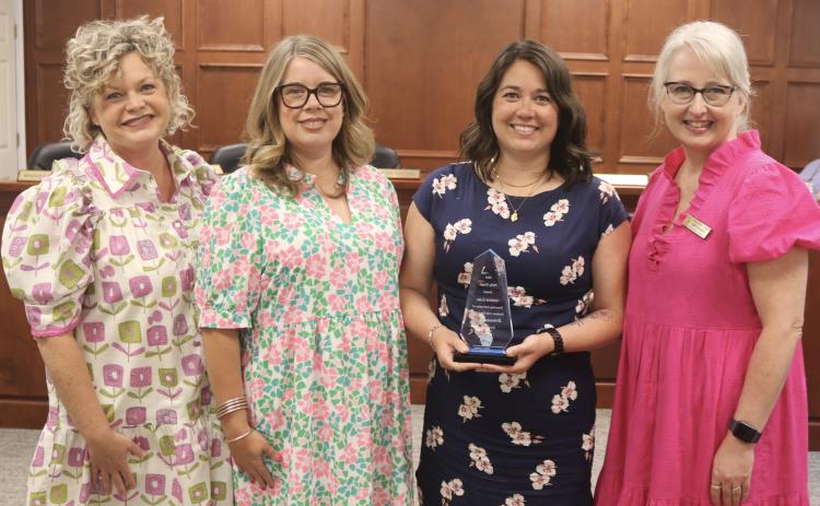 Pictured during the Hart County Board of Education’s April 21 meeting are (L-R) Superintendent Jennifer Carter, BOE Chair Kim Pierce, Support Services Administrative Assistant Brittany Geraty and Director of Special Services Julie Franklin. (Photo submitted by Grayson Williams)
