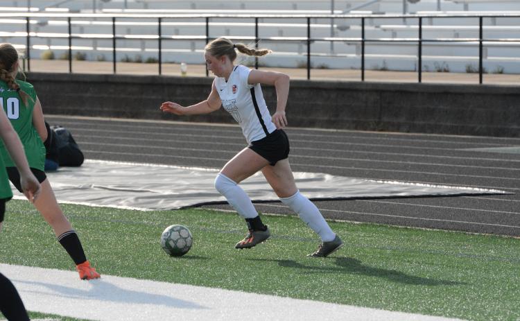 Midfielder Teague Pierce nets the lone goal in the 5-1 loss to Franklin County on March 28. (Photo/Benjamin London)