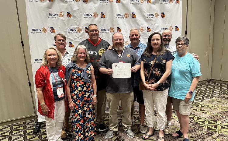 The club was named the District 6910 2024-2025 Club of the Year Runner-Up. Club members pictured with the award include (front row, L-R) Joni Ingram, Debbie Kulcsar, Jason Ford, Rebecca Metzger and Nancy Butler; (back row, L-R) Jeff Loggins, Georgia District Governor Bobby Hildreth, Mike Everett and Brian Metzger. (Photo submitted by Rotary Club of Hartwell)