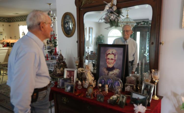 Evans reflects on his life with Evelyn in their home. When he’s not counting cars, Evans enjoys maintaining his yard – including cutting grass – and his home he shared with his wife of 72 years, Evelyn. (Photo/Rose Scoggins)