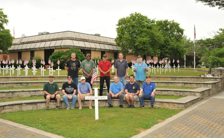 Members of American Legion Post 109 and Sons of the American Legion spent the morning of May 17 putting out crosses on the courthouse lawn to honor Hart County’s service men and women who made the ultimate sacrifice. The group will hold its annual Memorial Day ceremony Monday, May 26 at 11 a.m. in the courtroom inside the Hart County Courthouse. (Photo/Gus Cawley)