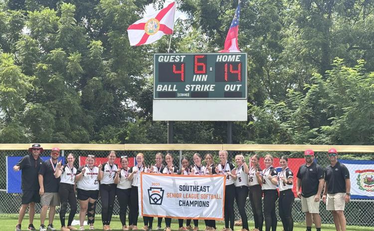 The Hart County Senior League Softball team poses in front of the scoreboard showcasing their dominating 14-4 win over Florida in the Southeast Regional Championship Monday in Clarkesville, Tennessee. As the Southeast Regional Champions, the team will represent Hart County in the Senior League Softball World Series for the first time in Hart County history July 28 through Aug. 3 in Lower Sussex, Delaware. (Photo courtesy of Hart County Little League)