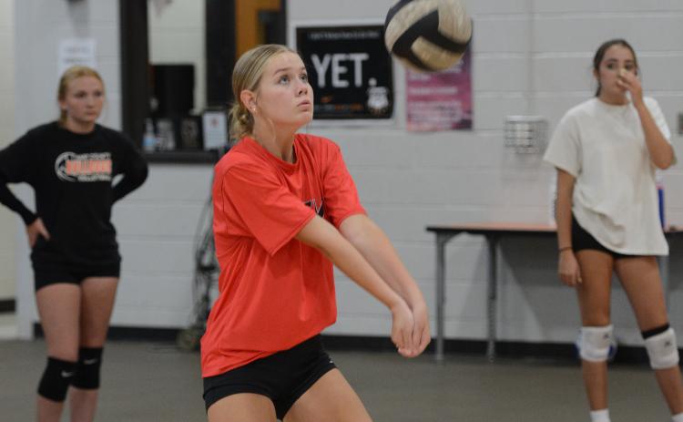 Rising sophomore Blair Allen works on passing during a summer practice. (Photo/Benjamin London)