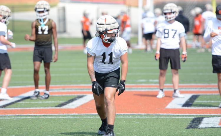 Rising senior tight end Boston Graham lines up before running a route.  (Photo/Benjamin London)