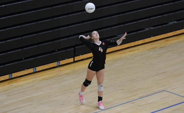 Rising senior libero Erin Miller serves during a match in 2024. (Photo/Benjamin London)