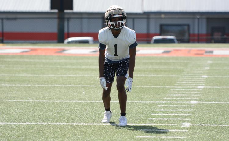 Rising senior safety Ramarcus Simpson awaits the snap during a practice in June. (Photo/Benjamin London)