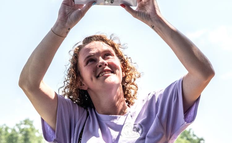 Big Hart Farm owner Maggie Jackson releases butterflies from a box during one of the farm’s many events July 5. (Photo/Bill Powell)