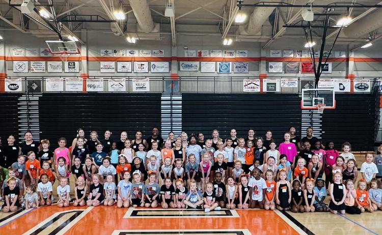 Pictured is nearly 80 campers alongside the current Hart County High School cheer squad at this years Little Bulldogs Cheer Camp Aug. 16. (Photo submitted by Hart County High School Cheer)