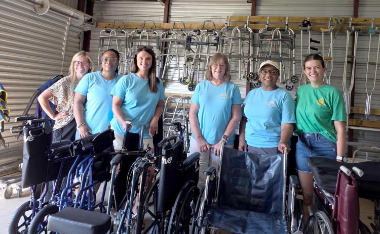 Pilot Club of Hartwell members (L-R) Laura Reed, Takia Wakefield, Tammy Beard, Joylynn Wilson, Chiquita Clark and Katelyn Wray pose inside a storage unit dedicated to the Friendship House program. The storage unit is fully stocked with walkers, wheelchairs, knee scooters and other medical supplies that are to be given to community members free of charge. (Photo submitted by Wray)