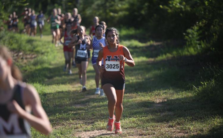 Pictured is senior Mareli Fajardo Bacilio as she placed 10th and 12th in the last two meets. (Photo by Bo Underwood)