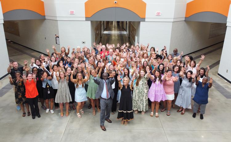 Faculty and staff at North Hart Elementary School celebrate being recognized as one of the Top 5 percent of Title  I schools in the state for its progress in improving student performance. (Photo submitted by Grayson Williams)