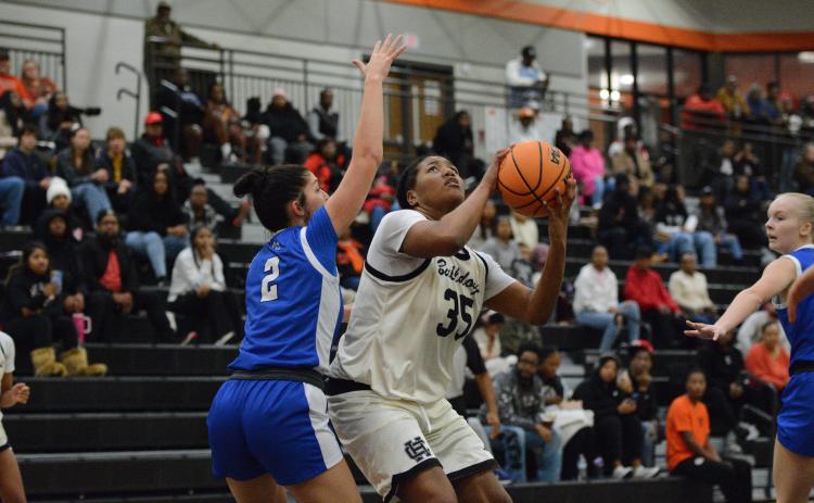 Sophomore forward Sarai Shealer drops 19 points to lead the team in scoring in the 59-47 loss to Oconee County in the McDonald’s Shootout Championship Game Dec. 30. Photo by Benjamin London.