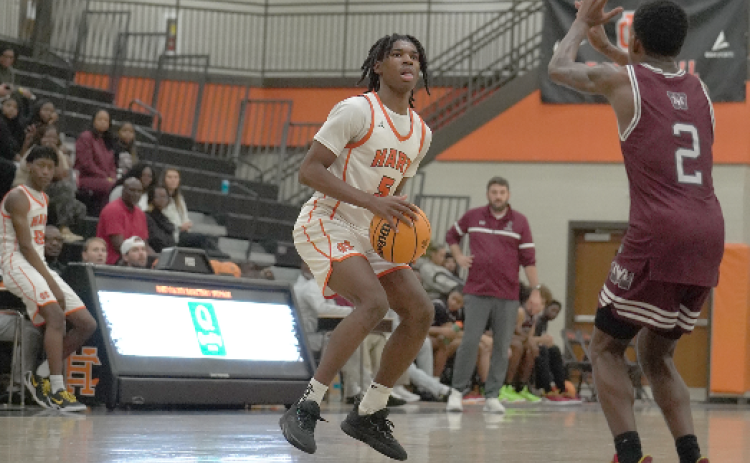 Senior forward Ramarcus Simpson pulls up for a three in the 67-56 loss to the Rams of Westside Jan. 10 in the North Georgia Report Lake Hartwell Border Battle. Photo by Ric Williams.