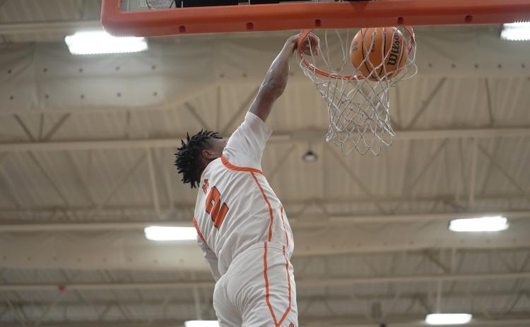 Senior guard Zaylen Shealer slams it home in the 66-48 win over the Indians of Stephens County Jan. 23.  Photo by Gavin Thomason.