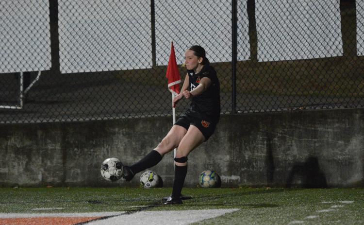 Photo by Benjamin London Madison Heaton sends a corner kick into play, as Hart captured a 5-0 win on the road against the Lady Patriots of Oglethorpe County Feb. 10. Photo by Benjamin London.