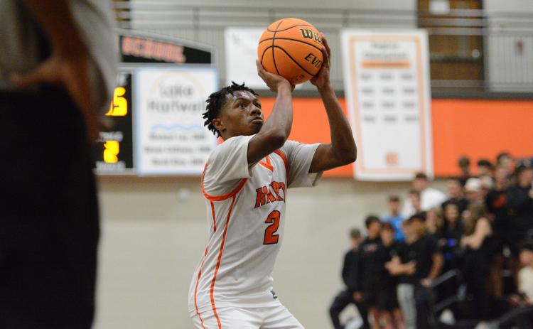 Senior guard Zaylen Shealer heads to the line for free throws for a game earlier in the season, as he had 16 points against Hebron and 14 points against Prince Avenue. Photo by Benjamin London.