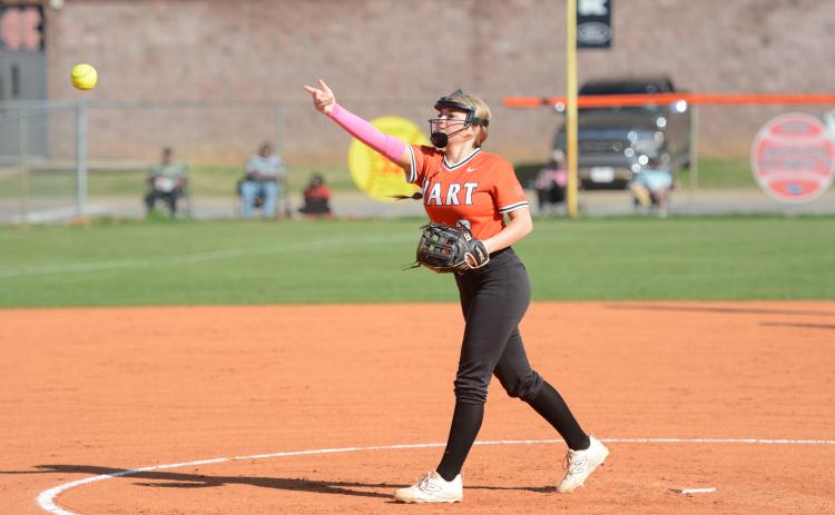 Pitcher Carly Dutton delivers the pitch in the 10-3 loss to the Lady Lions of  Franklin County March 11.  Photo by Benjamin London.