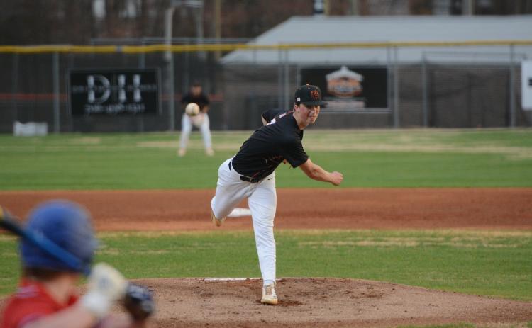 Junior pitcher Max Martin pitches three innings allowing eight hits, five earned runs, issued two walks and struck out four in the 8-6 loss to the Tigers of Crescent March 13. Photo by Benjamin London.