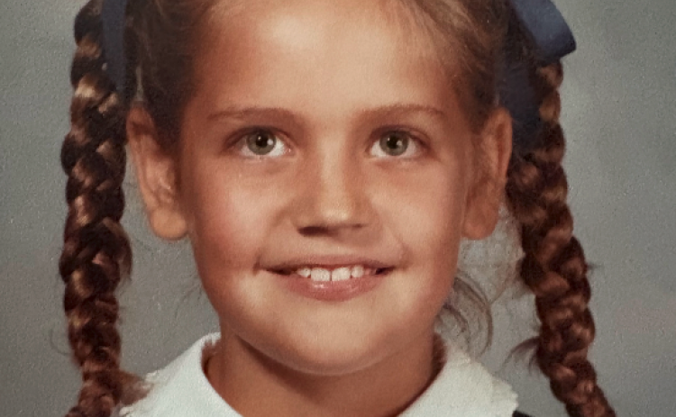 Emily was born in 1976, between her brothers, Alan and Eric. They loved teasing her and pulling her pigtails. Photo submitted by Dink NeSmith.