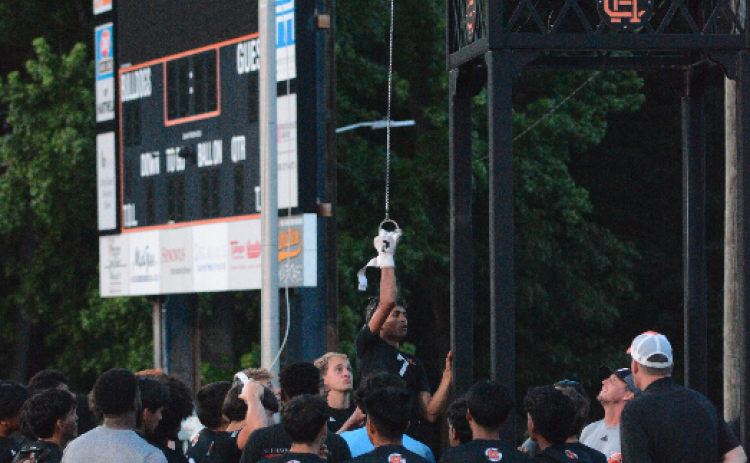 Midfielder Noé Ramírez Padilla rings the victory bell after scoring a hat trick in the 4-0 win over Josey April 24. Photo by Benjamin London.
