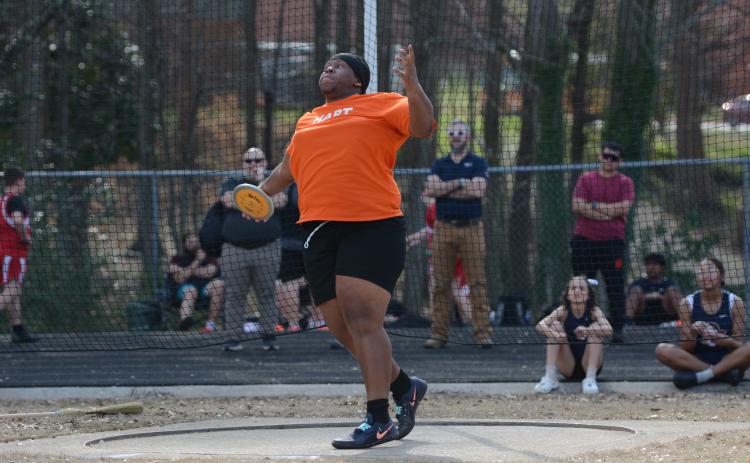 Senior Nicholas Carter competing in discus earlier this season, as he placed sixth in discus at Sectionals May 2 to advance to the State Meet May 14.  Photo by Benjamin London.
