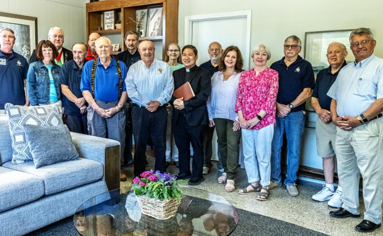 Representatives from Hart Life Pregnancy Care Center, Knights of Columbus and Sacred Heart Catholic Church pose for a photo prior to a ceremony at Hart Life May 8 to bless a new ultrasound machine. The brand new machine was purchased for Hart Life by donations from the Knights of Columbus, Respect Life of Atlanta, Sacred Heart Catholic Church, Hartwell First Methodist Church and numerous other anonymous donors. Photo by Bill Powell. 