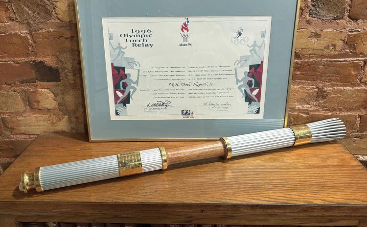 Atop an oak bookcase in my office sits the Olympic torch that I carried in 1996. Photo submitted by Dink NeSmith. 