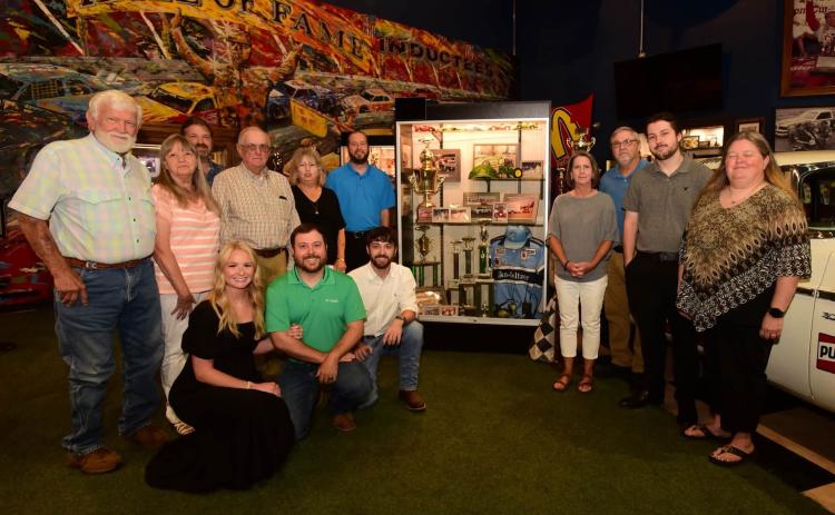 Gerald Voyles’ family and supporters gathered Saturday at his display after he was inducted to the Georgia Racing Hall of Fame in Dawsonville. Photos by Tom Reed, courtesy of the Georgia Racing Hall of Fame.