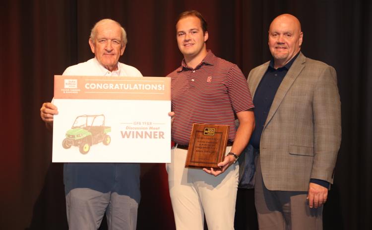 Georgia Farm Bureau President Tom McCall (left) and Tony Hutchins of Southern Farm Bureau Life Insurance (right) congratulate GFB YF&R Discussion meet winner Michael Howard (center). Photo courtesy of Georgia Farm Bureau.