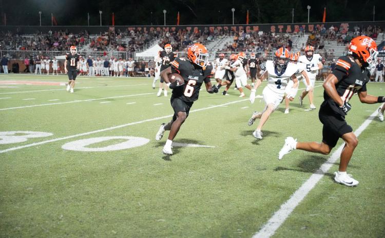 Football’s senior running back and defensive back Xavier Allen earns Athlete of the Week.  Photo by Ric Williams. 