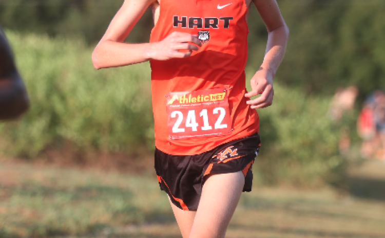 Senior Seyvn Singleton placed first to help the Dogs place first overall as a team at the Bill Woods & Jan Taylor Pridelands Invitational Sept. 19. Photo by Rose Scoggins.